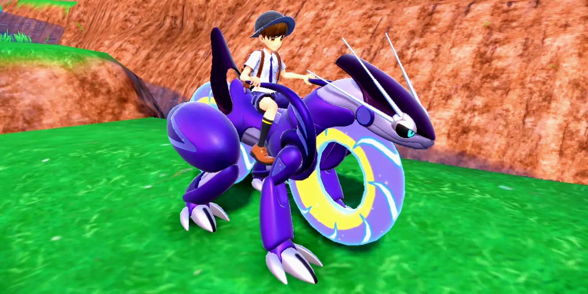 Um jogador Pokémon Violet montando o lendário Pokémon Miraidon.