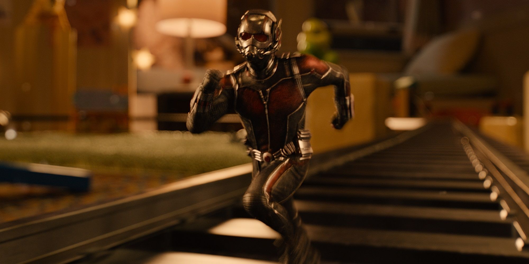 Scott Lang on a toy train track in Ant-Man