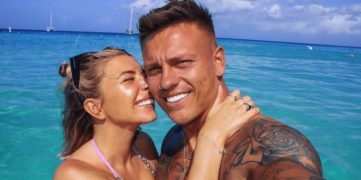 Alex and Olivia Love Island Season 2 smiling in the ocean