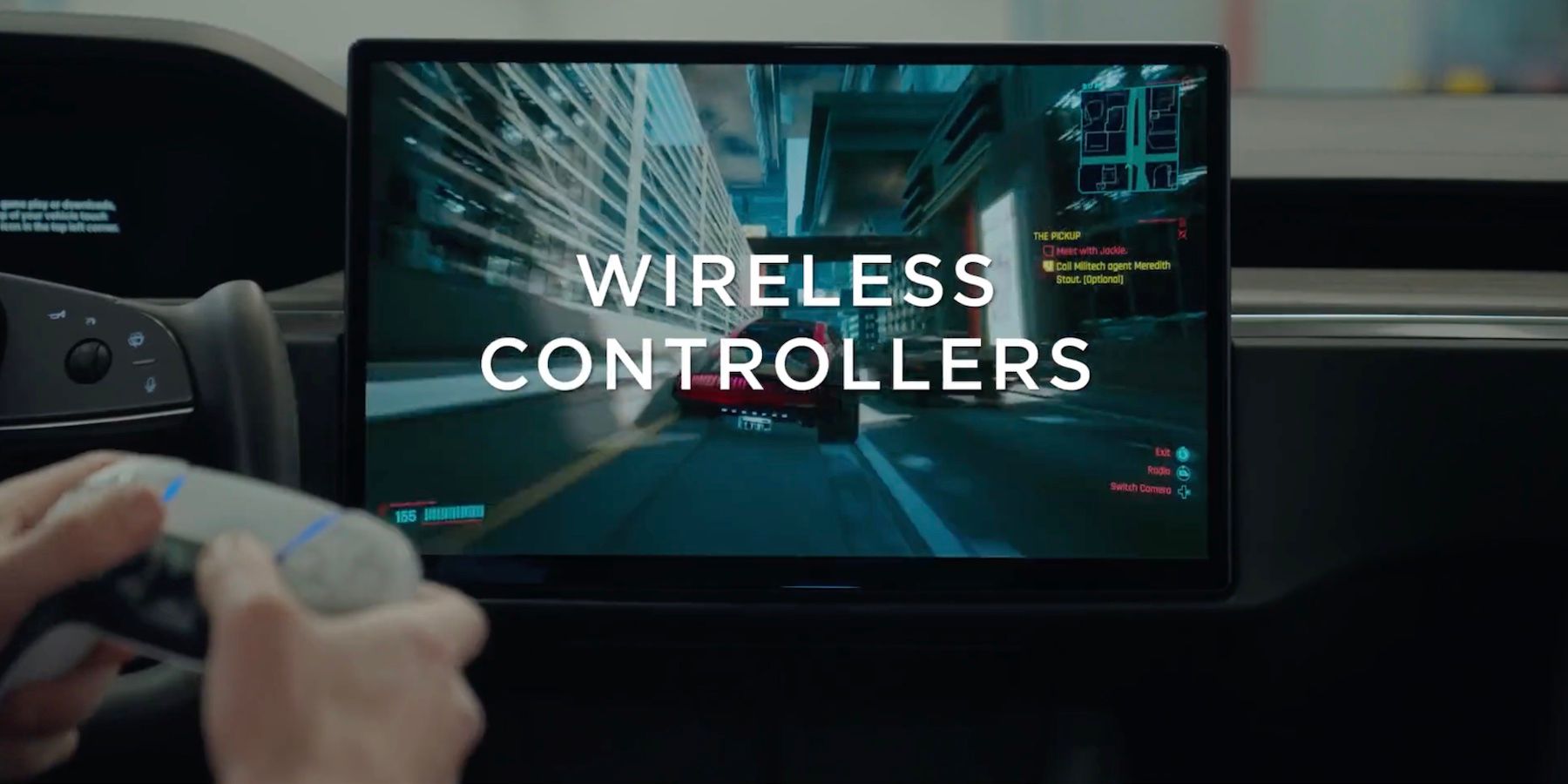 A person playing Steam with a wireless controller inside a Tesla