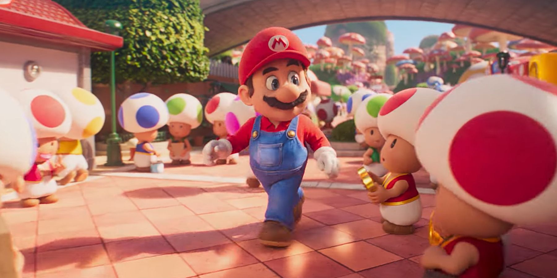 Mario walking through the Mushroom Kingdom in the Super Mario Bros. movie