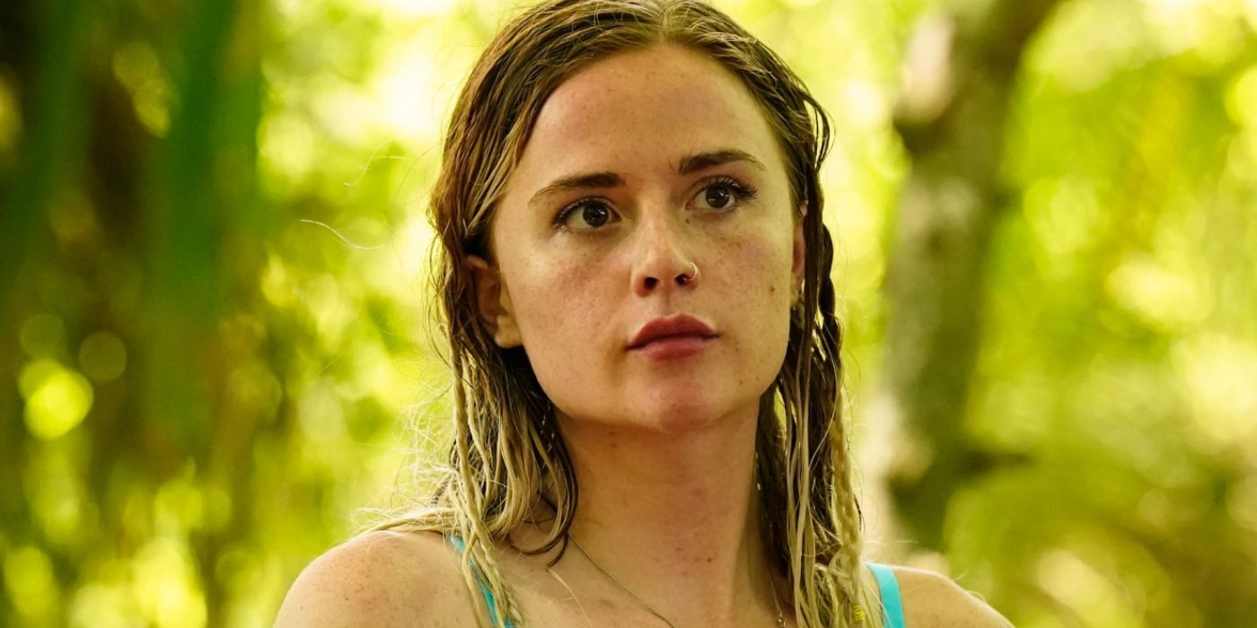 Cassidy Clarkon from Survivor 43 in the jungle with serious look on her face