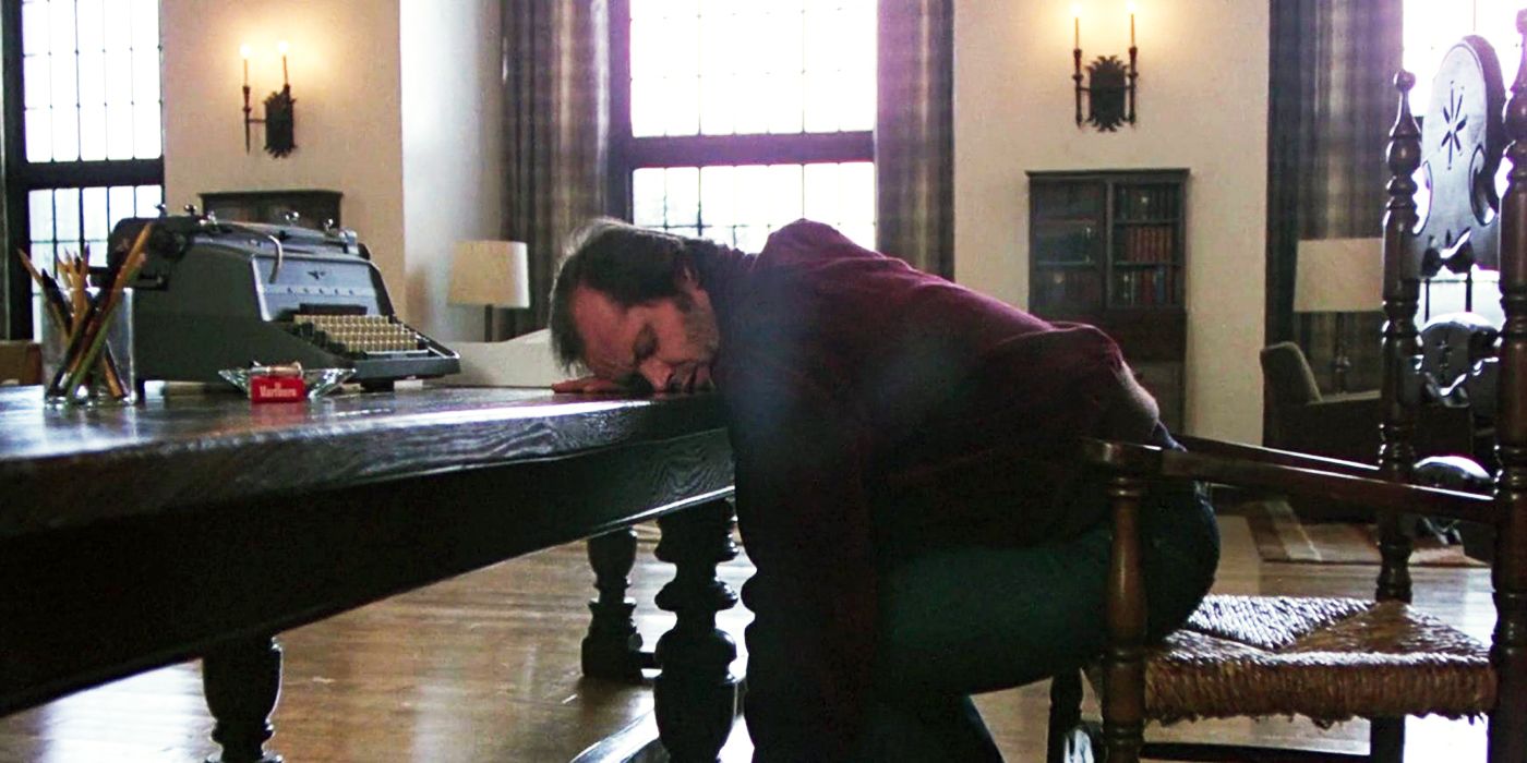 The Shining's Jack Torrance sleeping at a desk