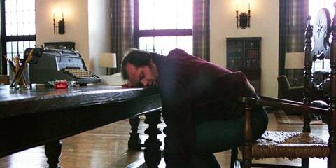 Jack Torrance sleeping at a desk in The Shining