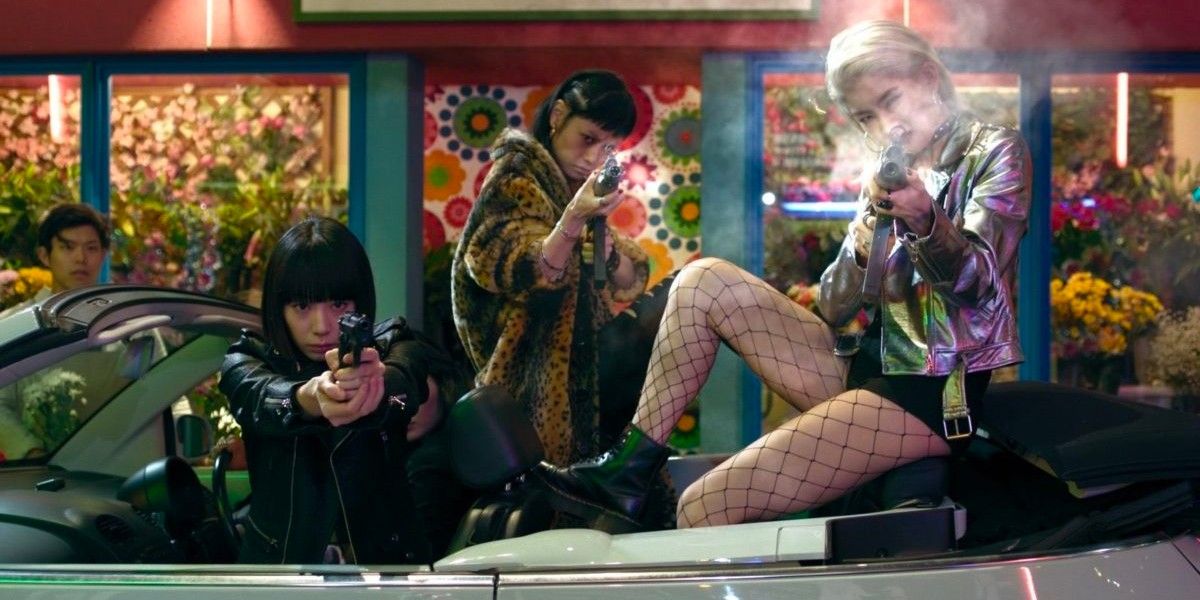 Three women shooting guns in Tokyo Vampire Hotel