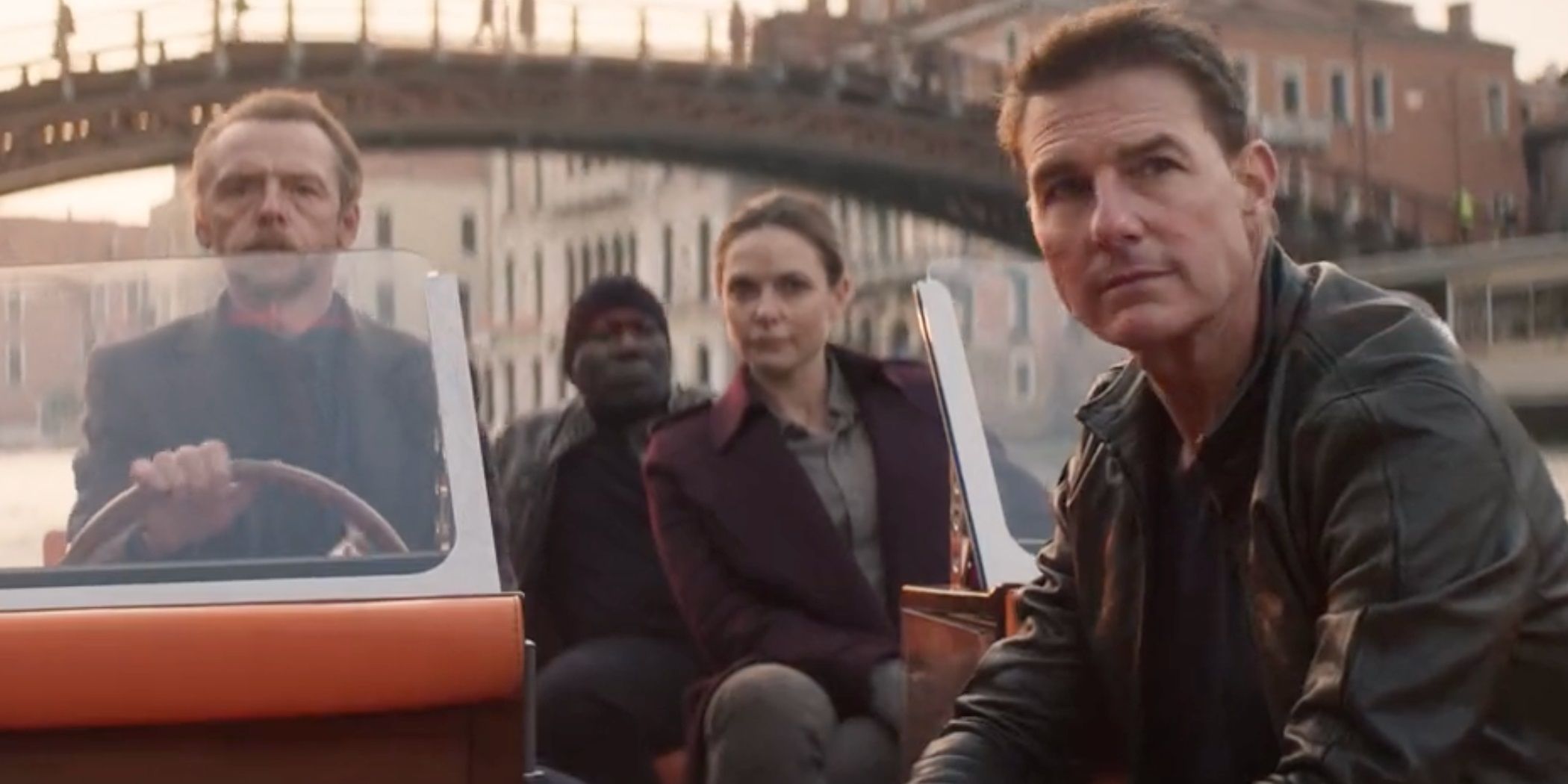 Tom_Cruise_Simon_Pegg_Rebecca_Ferguson_and_Ving_Rhames_on_a_boat_in_Mission_Impossible_Dead_Reckoning_Part_One