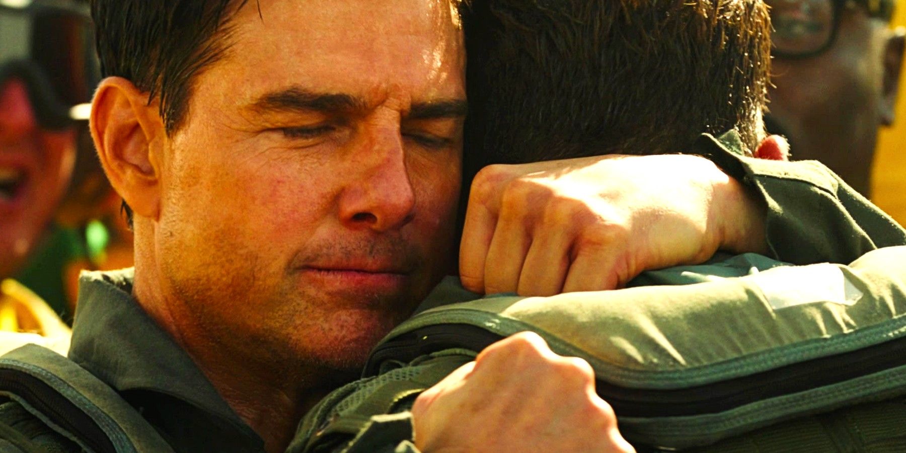 Tom Cruise's Maverick hugs Rooster in Top Gun Maverick's Ending