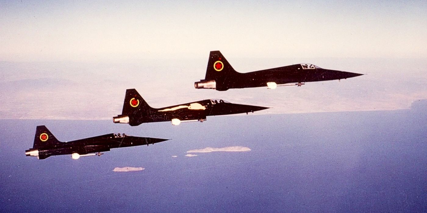 Three F-5s flying in the sky in Top Gun