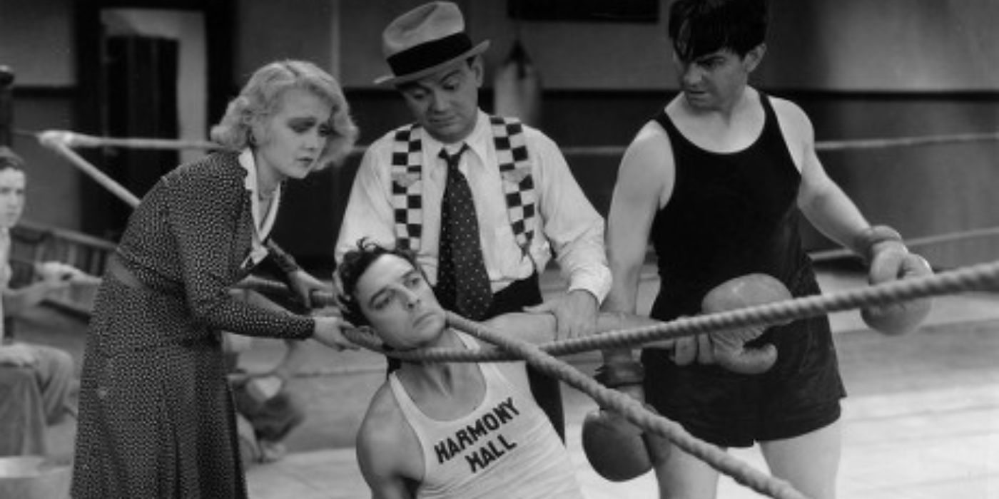 uster Keaton caught between a boxing ring's ropes in Sidewalks of New York