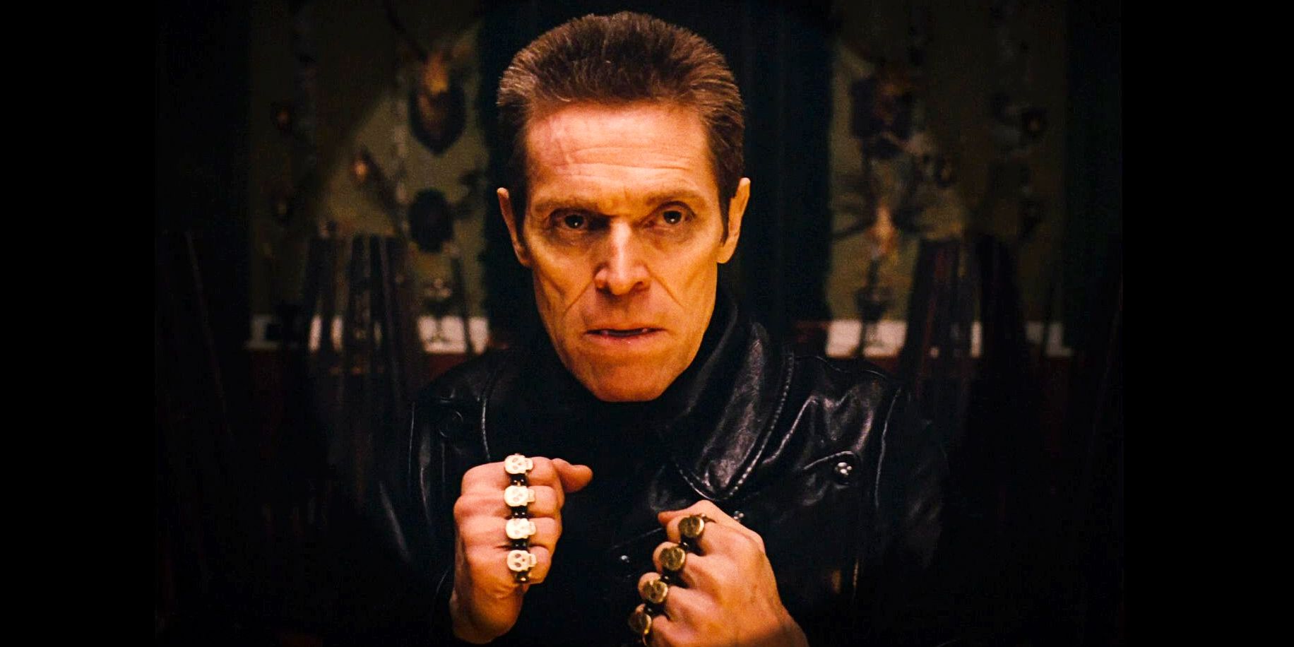 Willem Dafoe wearing brass knuckles in The Grand Budapest Hotel