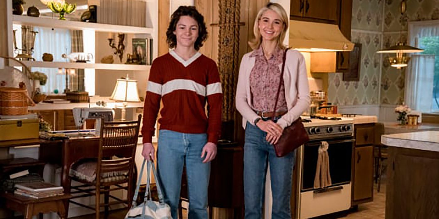 Georgie from Young Sheldon standing with Veronica, holding her bag.