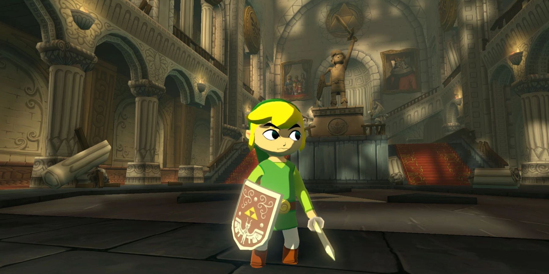 Link standing in the main hall of Wind Waker's Hyrule Castle, with broken pillars and a statue of the Hero of Time in the background.