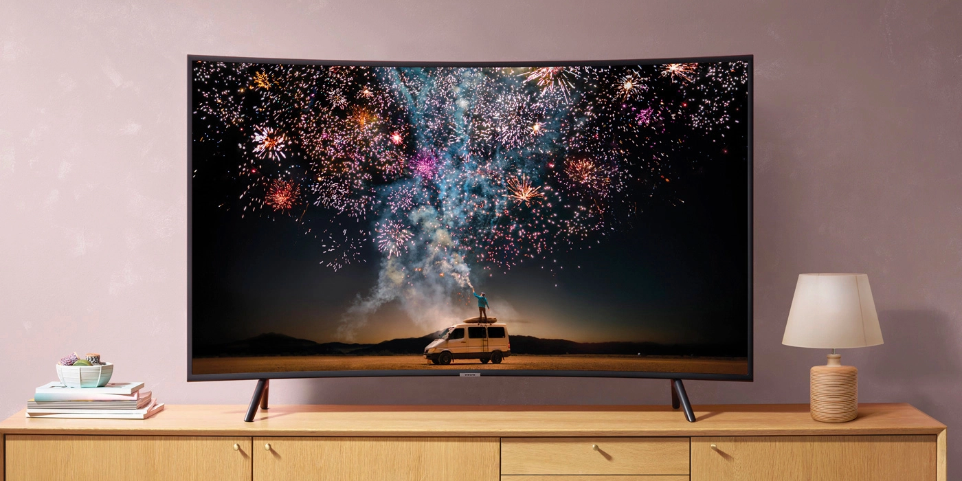 Curved TV with fireworks