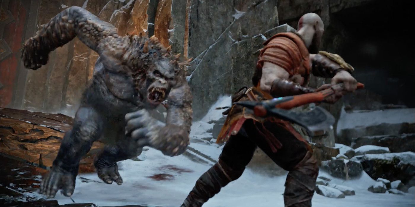 Kratos in combat in God of War (2018).