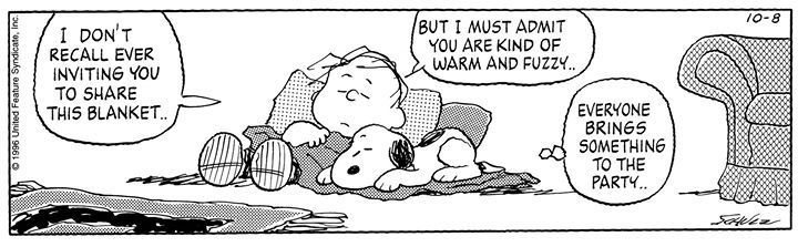 Linus sleeping with Snoopy