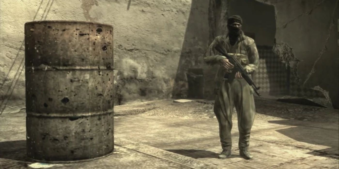 A guard standing next to a barrel in an infamous toilet humor scene from Metal Gear Solid 4-2