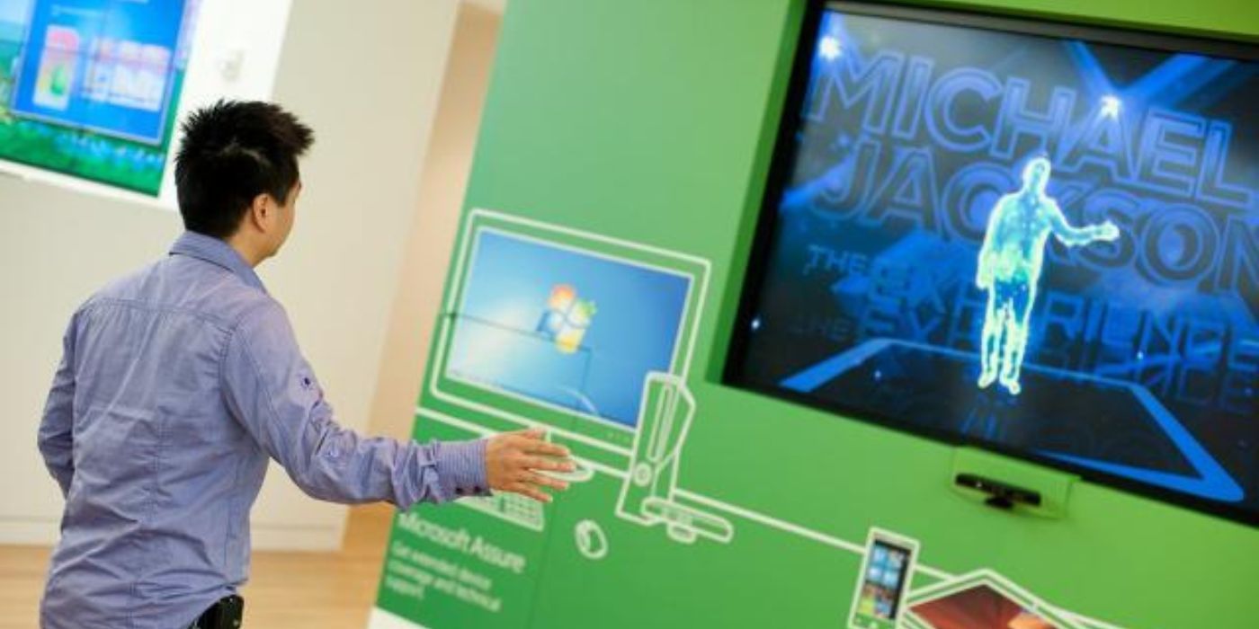 A man playing with the Microsoft Kinect