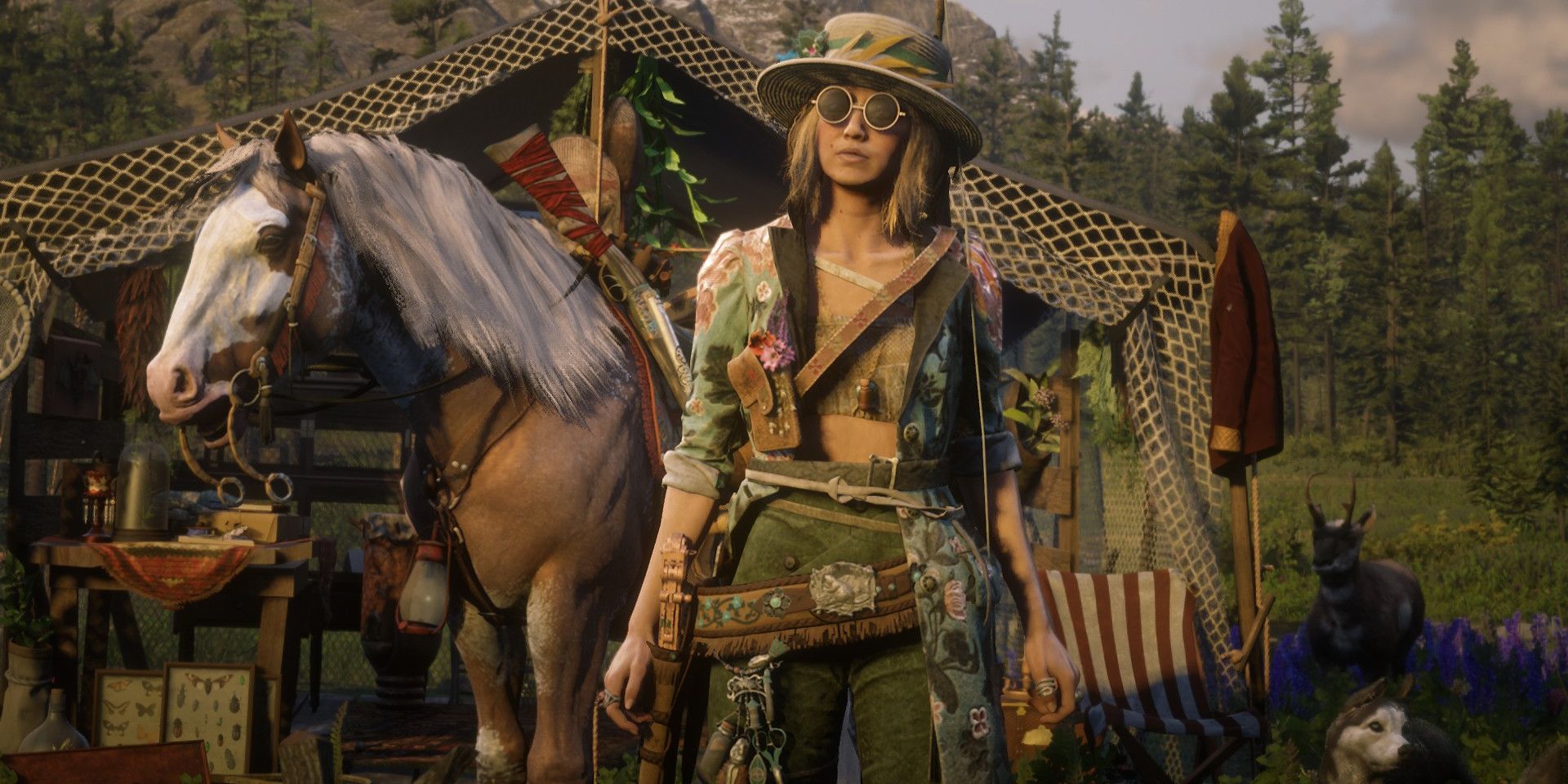 A Red Dead Online player character in front of a tent surrounded by some of the game's wildlife: a horse, a deer, and a dog
