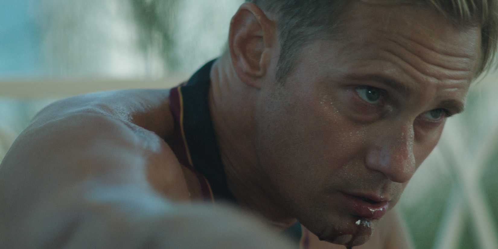 James' (Alexander Skarsgard) clone looking sick in Infinity Pool. 