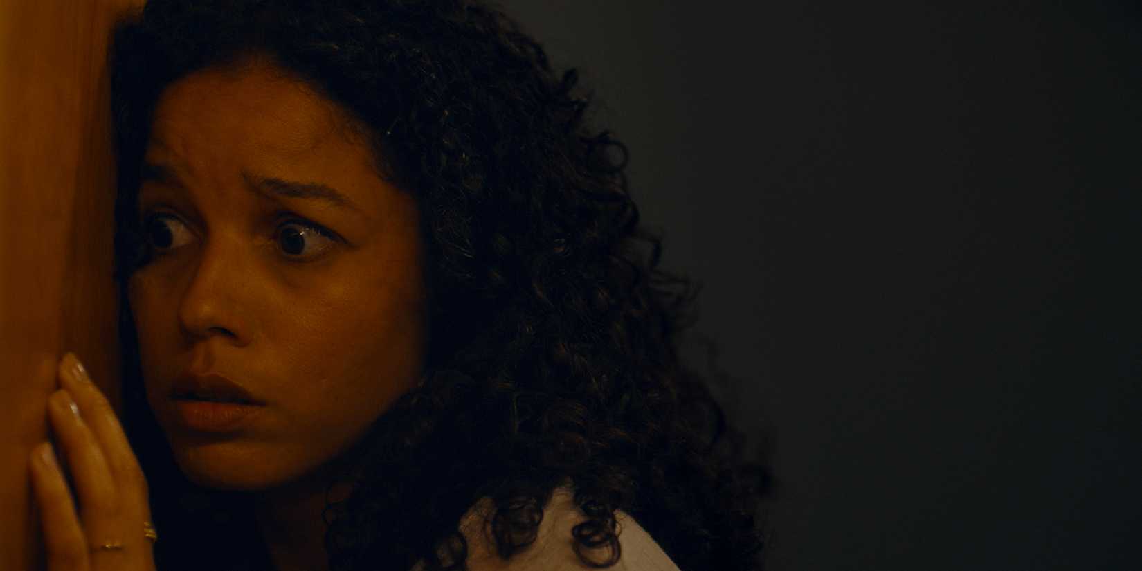 Alisha Wainwright as Margaret by a wall in There's Something Wrong with the Children.