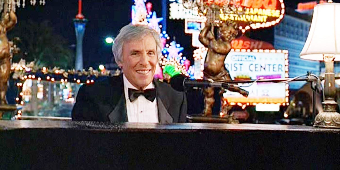  Burt Bacharach smiles while playing piano in Austin Powers 
