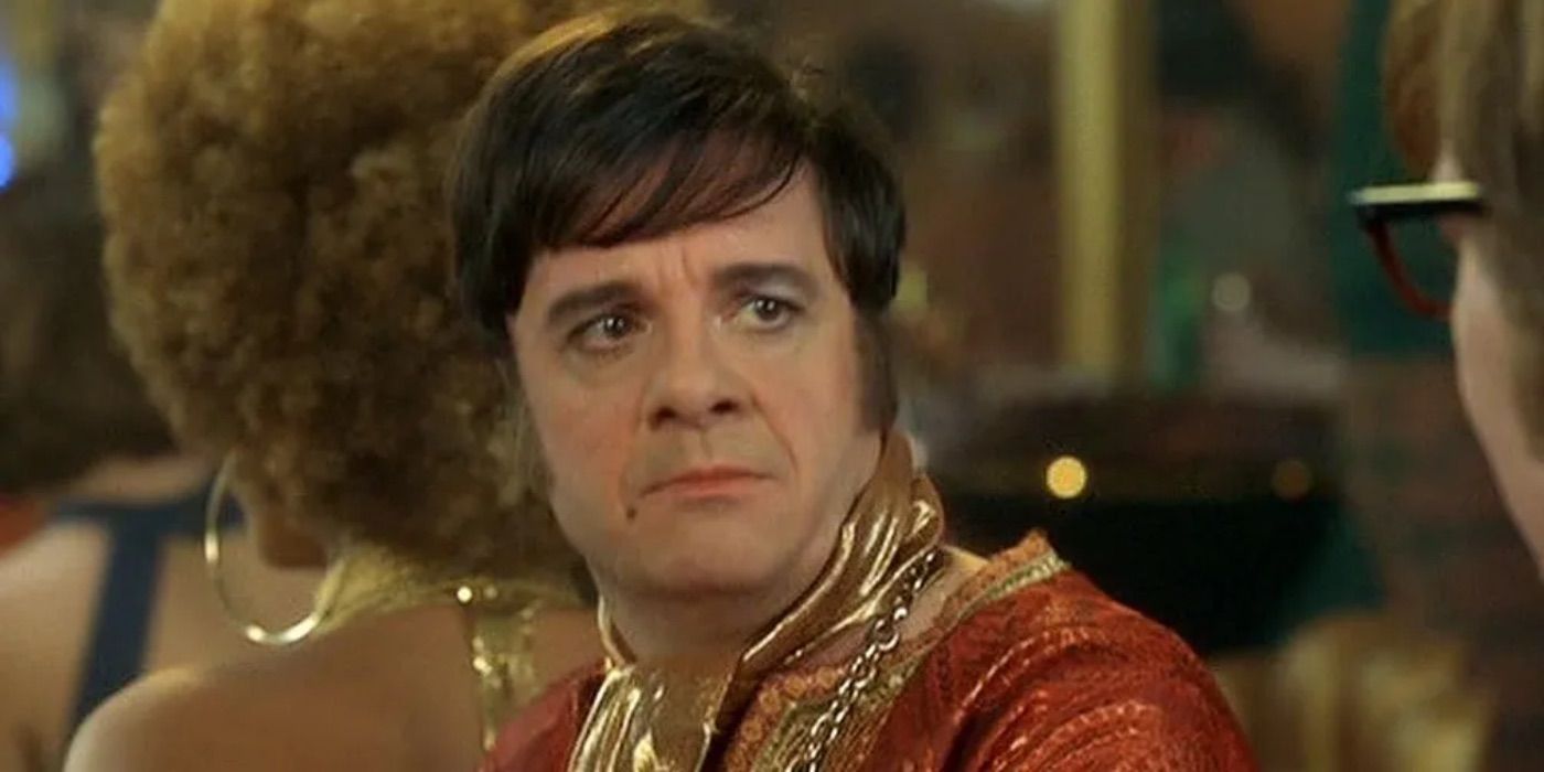 Nathan Lane looks on in Austin Powers 