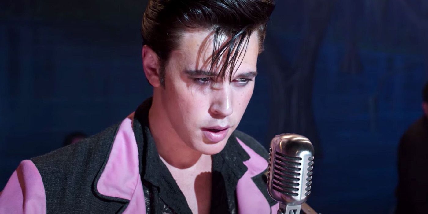 Austin Butler Standing at a Microphone in Elvis