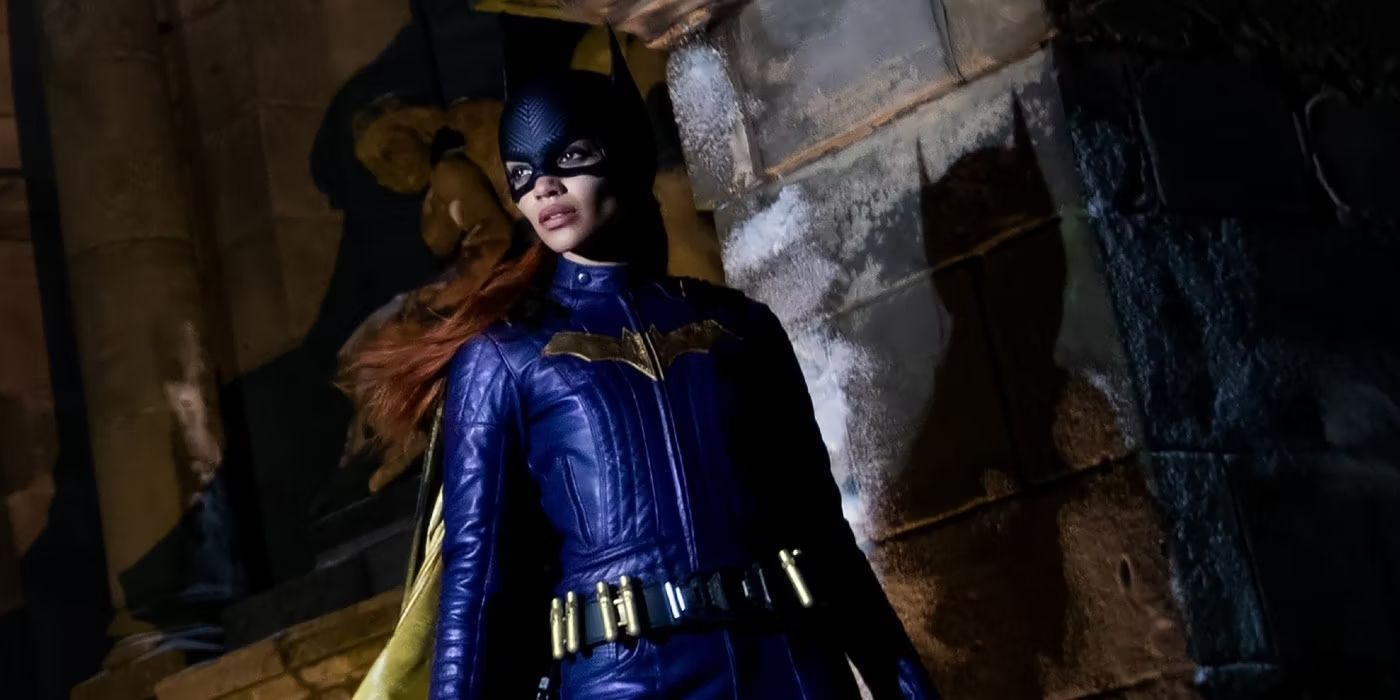 Leslie Grace As Batgirl looking sideways in an alley in Gotham City