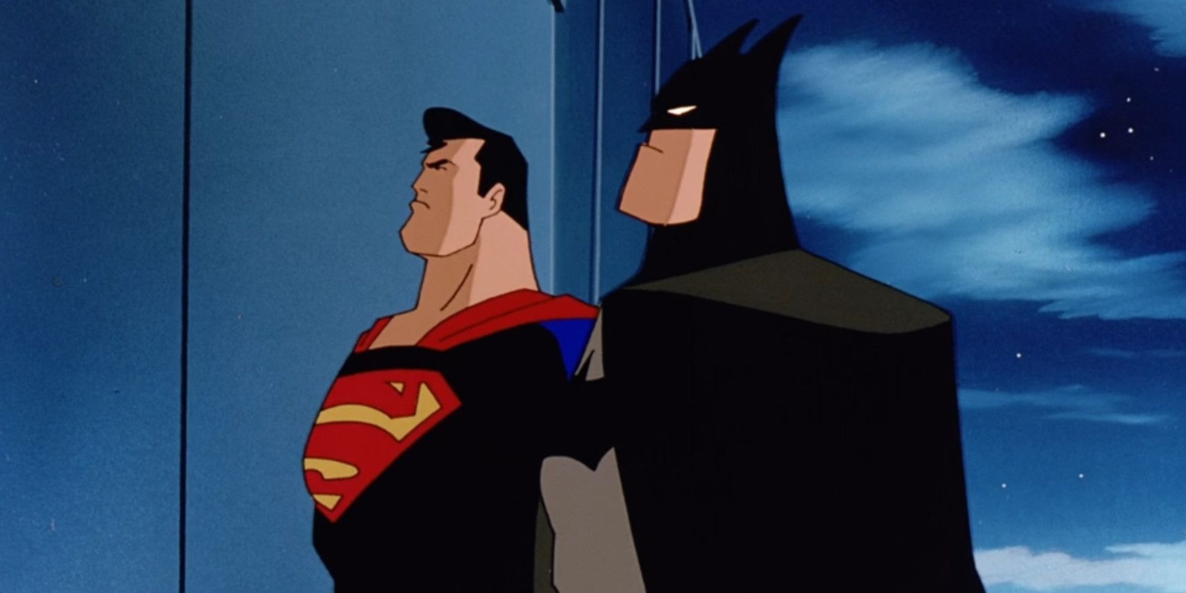 Batman and Superman standing together in World's Finest animated movie.