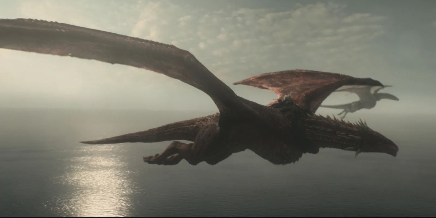 Caraxes voando ao lado de outro dragão