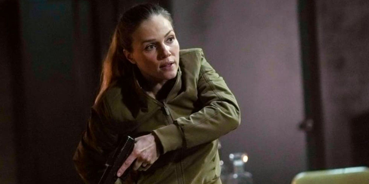 Hailey Upton pointing a gun downward on Chicago PD