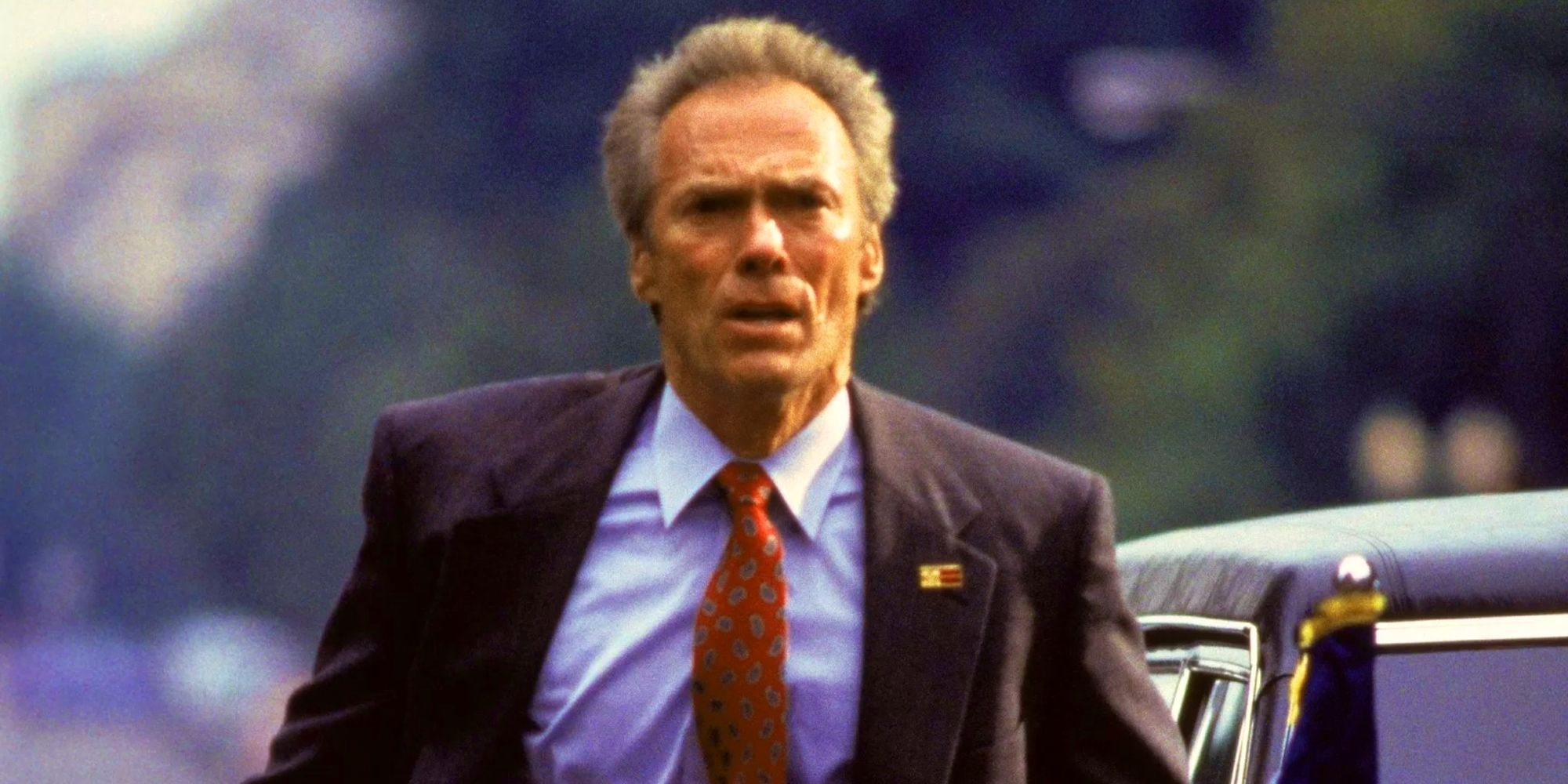 Clint Eastwood running down the street in In the Line of Fire