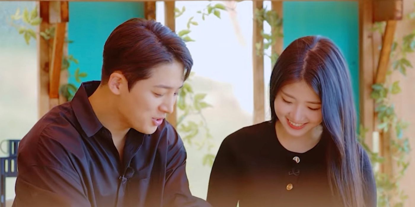 Moon Se-hoon and Shin Ji-yeon on Single's Inferno looking down and smiling