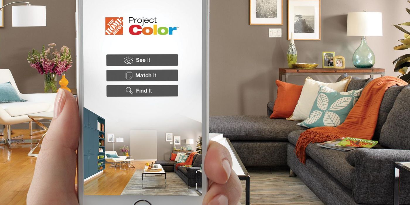 The Home Depot ProjectColor app on a phone surrounded by a decorated room.