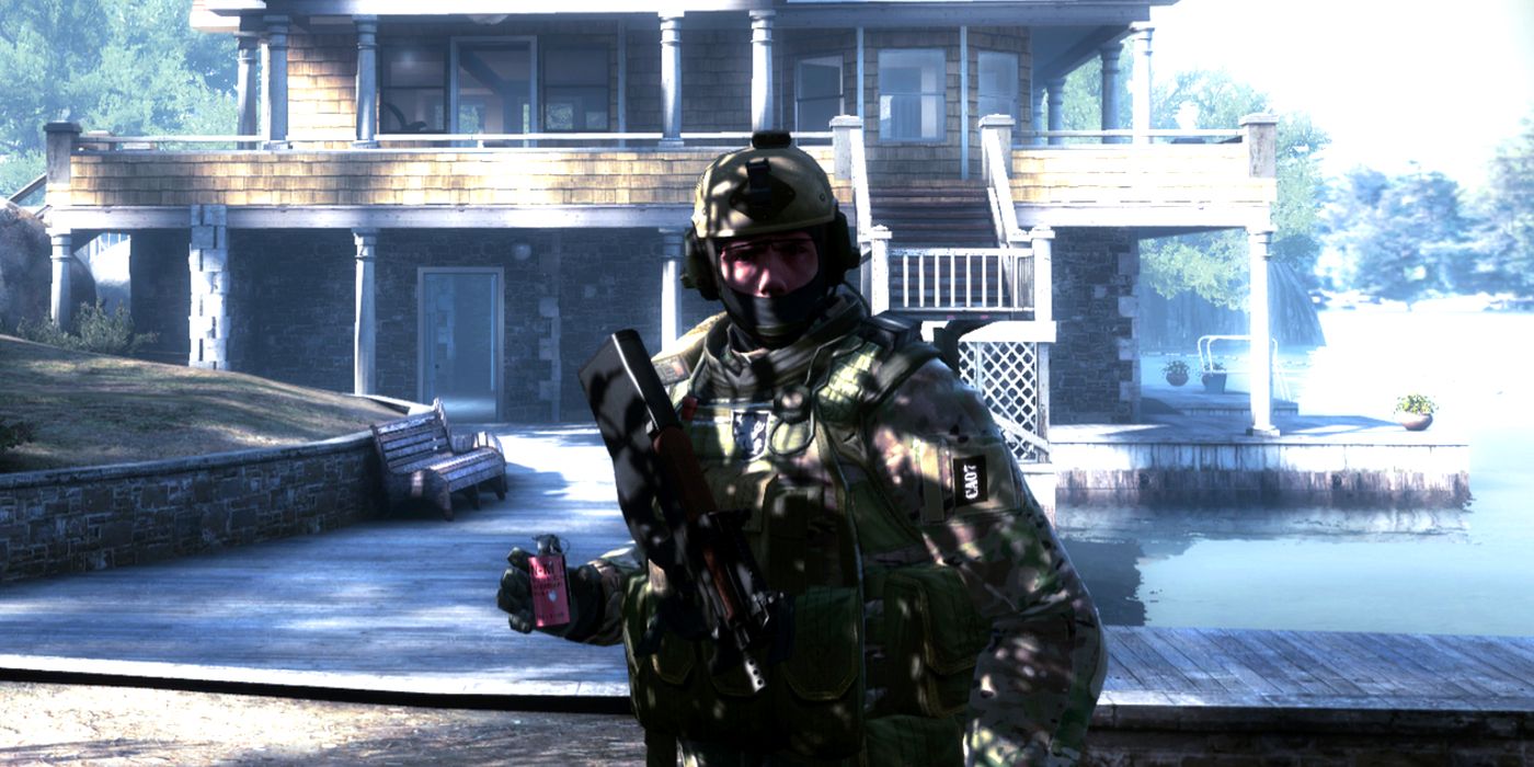 A soldier in Counter Strike Global Offensive holding a stun grenade while standing in front of a house on a lake