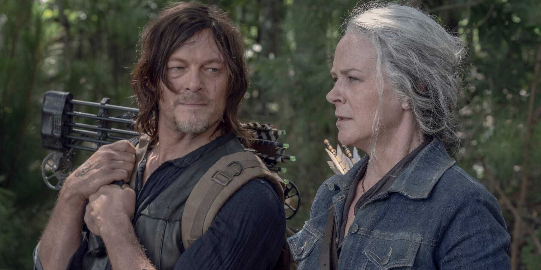 Norman Reedus as Daryl looking at Melissa McBride as Carol in The Walking Dead