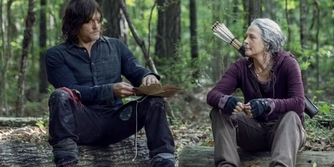 Daryl and Carol sit on a log in The Walking Dead.