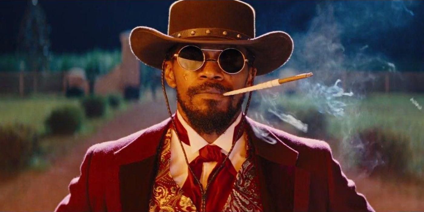 Jamie Foxx as Django watching the plantation burn at the end of Django Unchained