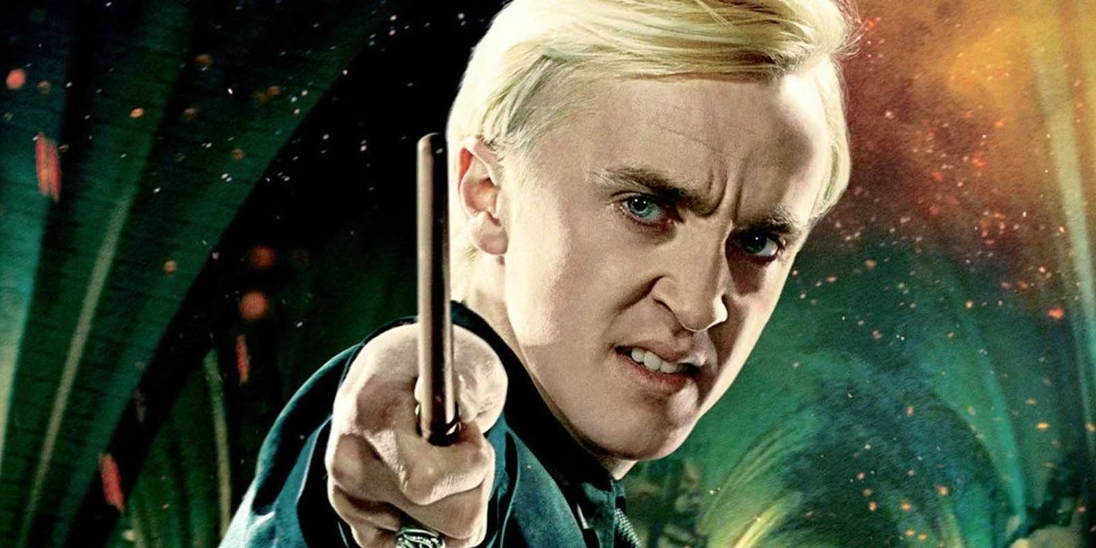 Draco Malfoy holding his wand in Harry Potter. 