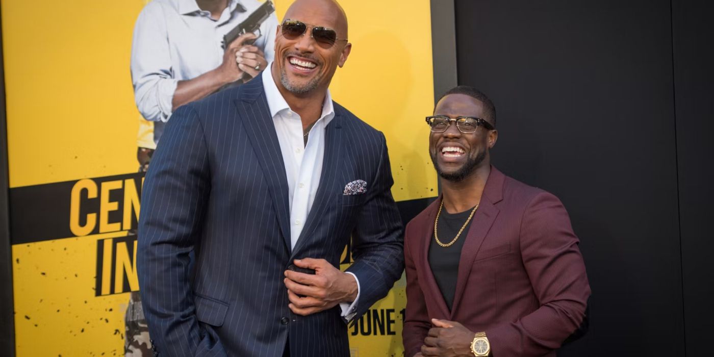 Dwayne Johnson poising with Kevin Hart