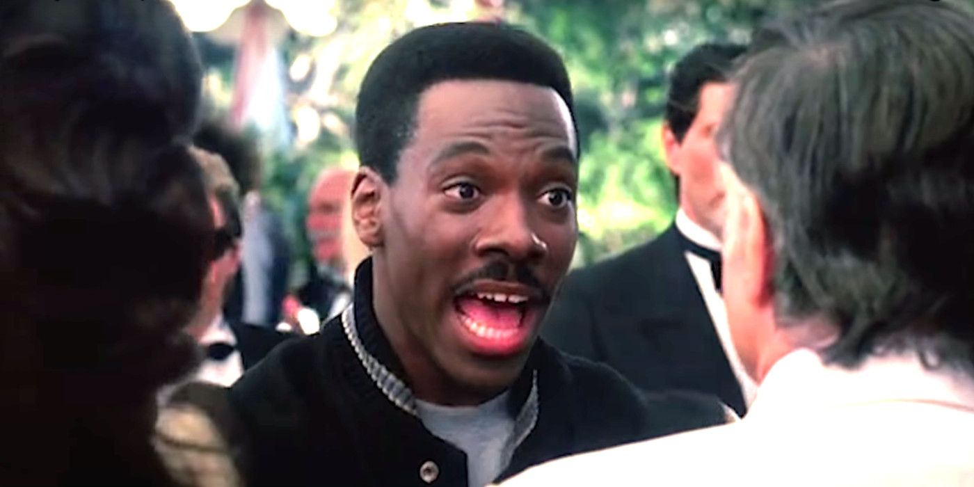 Eddie Murphy as Axel Foley in Beverly Hills Cop 2 having a animated conversation on the street with several people