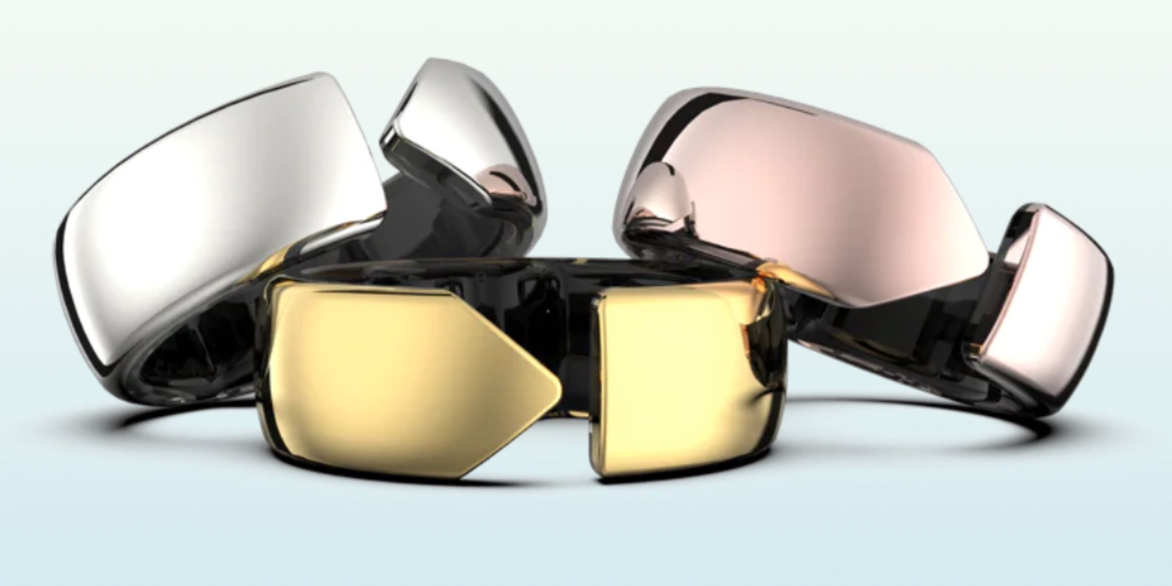 A promotional image of three Evie Smart Rings against a white background.