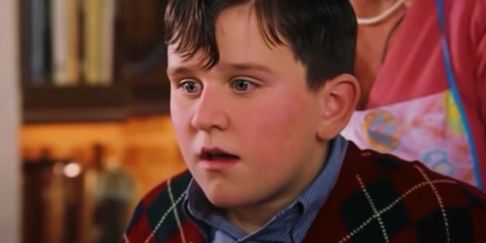 Harry Melling as Dudley Dursley looking distraught in Harry Potter