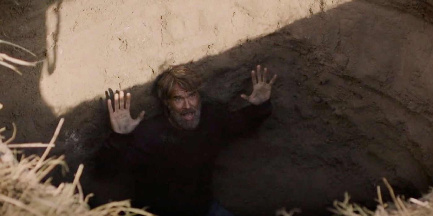 Frank les mains levées après être tombé dans le piège de Bill dans Last of Us Episode 3