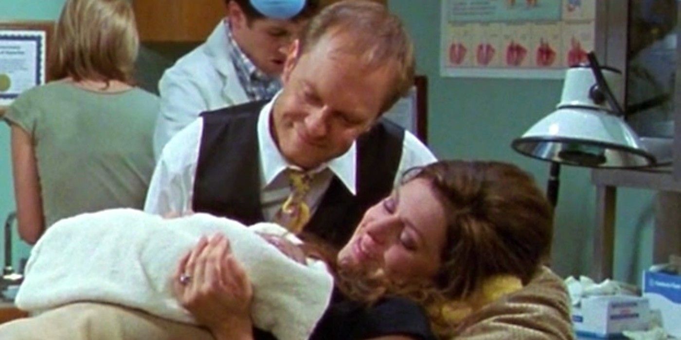 Niles y Daphne mirando a su hijo en Frasier