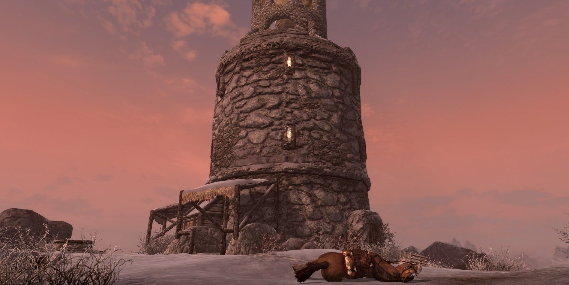 A Skyrim screenshot showing the exterior of Frostflow Lighthouse.