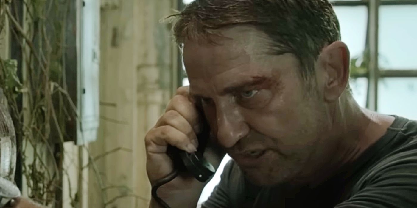 Gerard Butler talking on the phone in Plane.