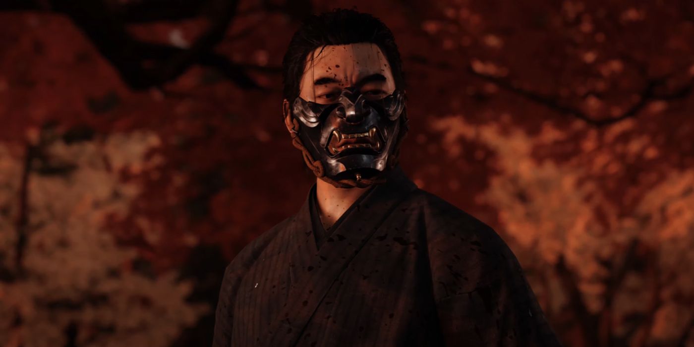Jin Sakai from Ghost of Tsushima, wearing a black robe and the black Ghost mask with blood splattered on his face.