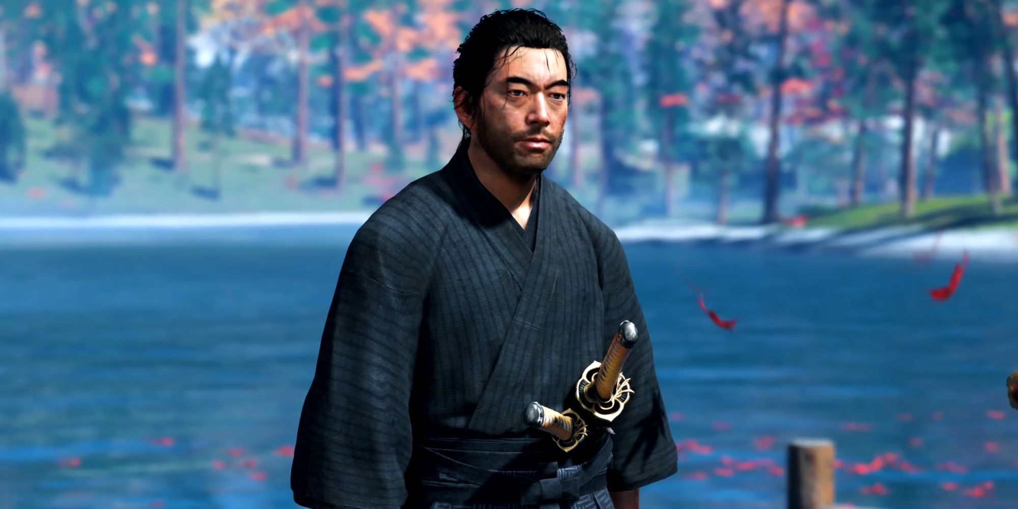 Jin Sakai standing on a dock with the lake behind him, speaking to his uncle near the end of Ghost of Tsushima.