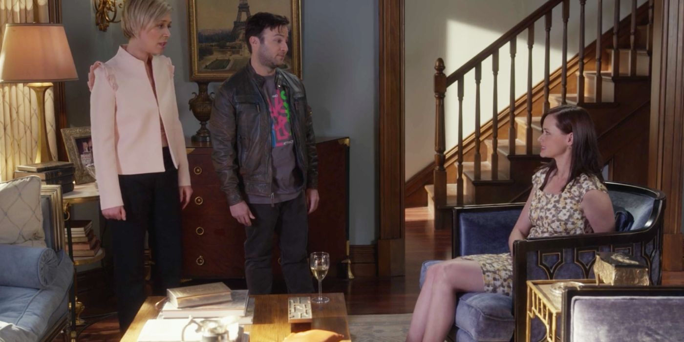 Paris and Doyle taking to Rory in the living room of their house in Gilmore Girls: AYITL